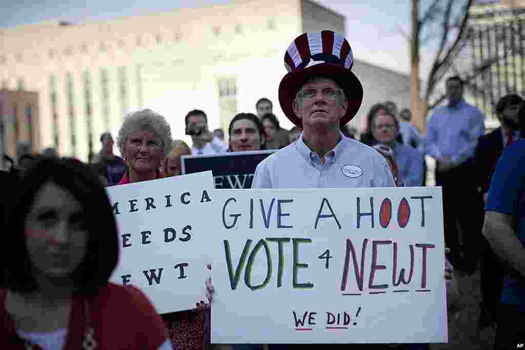 Supporters of Republican presidential candidate Newt Gingrich listen to him speak during a campaign rally in Nashville, Tennessee. (AP)