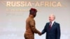 FILE—Burkina Faso's Capt. Ibrahim Traore, left, and Russian President Vladimir Putin shake hands before an official ceremony to welcome the leaders of delegations to the Russia Africa Summit in St. Petersburg, Russia, Thursday, July 27, 2023