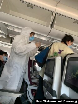 Cabin crews on a Qatar Airways special flight to Iraq wore hazmat suits during flights in light of the Covid-19 pandemic.