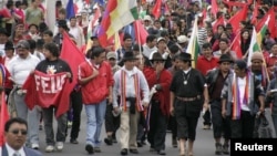 Ecuadorean Indians participate in a march to the capital city Quito to protest against the El Mirador copper mining project, in Cotopaxi, March 19, 2012. 