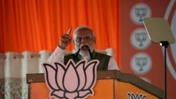 Perdana Menteri India Narendra Modi berpidato pada rapat umum pemilihan di Srinagar, Kashmir yang dikuasai India, Kamis, 19 September 2024. (Mukhtar Khan/AP)