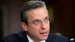 FILE - Puerto Rico Gov. Alejandro Garcia Padilla, shown testifying before Congress in December 2015, has previously declared fiscal emergencies at the Government Development Bank and Puerto Rico Highway and Transportation Authority.