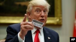 President Donald Trump speaks during a meeting with the National Association of Manufacturers, March 31, 2017, in the Roosevelt Room of the White House in Washington. 