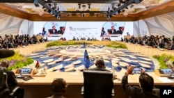 Indonesian President Joko Widodo delivers remarks as members of African delegations listen during the plenary session of the second Indonesia-Africa Forum in Nusa Dua, Bali, Indonesia, on Sept. 2, 2024.