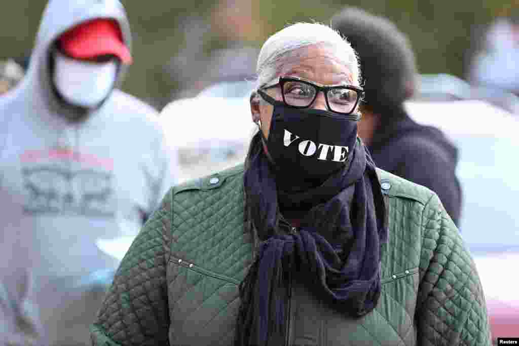 Voters wait in line on Election Day in Franklin Park, Allegheny County, Pennsylvania, Nov. 3, 2020. 