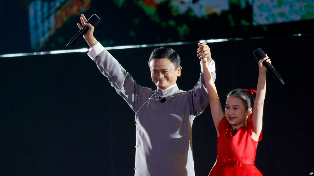 FILE - Jack Ma executive chairman of Alibaba Group gestures to the audience during the closing ceremony for the 18th Asian Games in Jakarta, Indonesia, Sept. 2, 2018. 