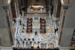 Pope Francis celebrates a Mass for the 100th anniversary of the birth of Pope John Paul II, in St. Peter's Basilica, at the Vatican, May 18, 2020.