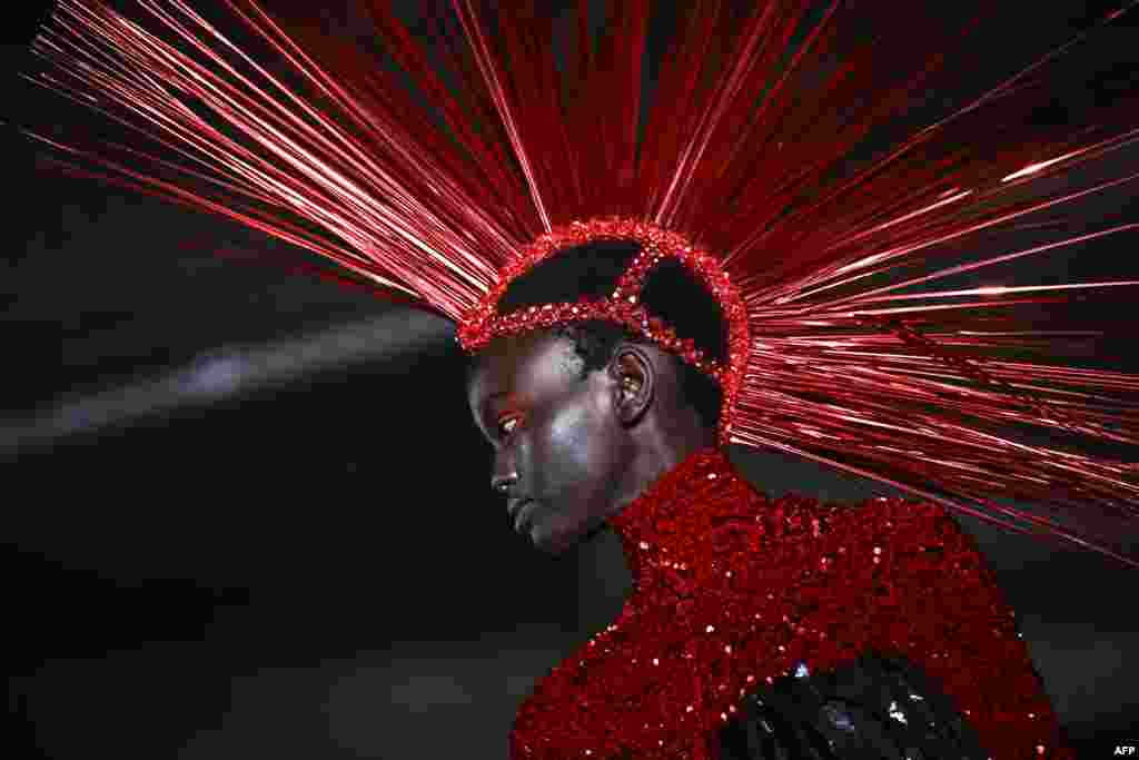 A model presents a creation by Germanier for the Women Ready-to-wear Spring-Summer 2025 collection as part of the Paris Fashion Week, in Paris.