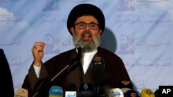 FILE - Senior Hezbollah leader Hashem Safieddine speaks during a conference in the southern Beirut suburb of Dahiyeh, Lebanon, Jan. 12, 2022.