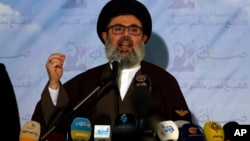 FILE - Senior Hezbollah leader Hashem Safieddine speaks at a conference in the southern Beirut suburb of Dahiyeh, Lebanon, Jan. 12, 2022. Prime Minister Benjamin Netanyahu said on Oct. 8, 2024, that Israel has killed Safieddine, who was presumed to become Hezbollah's new leader.