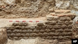 A view of part of the wall of the Roman London Basilica, which has been recently unearthed by a redevelopment of a building in London, is seen in this photo provided by the Museum of London Archaeology taken in summer 2024.