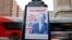 FILE - A sign criticizing U.S. Environmental Protection Agency Administrator Scott Pruitt is seen posted on the base of a utility pole in Washington, D.C., April 6, 2018.