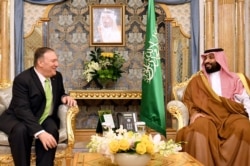 U.S. Secretary of State Mike Pompeo, left, meets with Saudi Arabia's Crown Prince Mohammad bin Salman in Jeddah, Saudi Arabia, Sept 18, 2019.