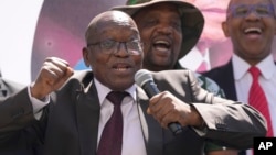 FILE - Former South African president, Jacob Zuma, sings and dances after addressing his supporters of the UMkhonto WeSizwe, (MK) party outside the High court in Johannesburg, South Africa, on April 11, 2024.