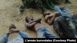 Une photo prise par l'armée burundaise présentant de présumés insurgés accusés pour les attaques contre des camps militaires le 11 décembre 2015, à Bujumbura. L'armée Burundaise