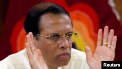 FILE - Sri Lanka's President Maithripala Sirisena speaks during a meeting with Foreign Correspondents Association at his residence in Colombo, Nov. 25, 2018.