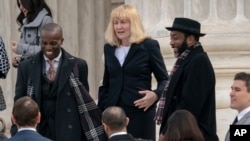 FILE - Attorney Sheri Johnson leaves the Supreme Court after challenging a Mississippi prosecutor's decision to keep African-Americans off the jury in the trial of Curtis Flowers, in Washington, March 20, 2019.