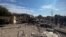 A destroyed building is pictured at the site of a U.S. airstrike in al-Qaim, Iraq, on Feb. 3, 2024.