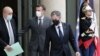 FILE - U.S. Secretary of State Antony Blinken leaves as French President Emmanuel Macron, center, gestures toward French Foreign Minister Jean-Yves le Drian, left, at the Elysee palace, June 25, 2021. Blinken will visit Macron next week, the U.S. announced on March 27, 2024.