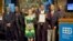 BBG Governor Dana Perino (center) with VOA Creole Service Staffers (from left) Jean-Robert Phillipe, Jacques Jean-Baptiste, Lyonel Besmarattes, Coralie Saint-Louis, Jacquelin Belizaire, Service Chief Ronald Cesar, Jean-Pierre Leroy and Cherubin Dorcil.