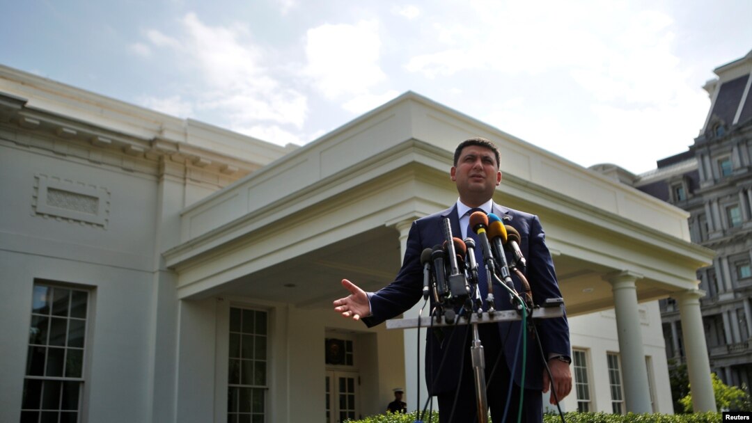 Ukraine's Prime Minister Volodymyr Groysman talks to members of the media after a meeting with U.S. Vice President Joe Biden, at the White House in Washington U.S., June 15, 2016.