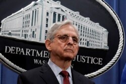 FILE - U.S. Attorney General Merrick Garland attends a news conference at the Department of Justice in Washington, June 25, 2021.