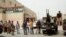 Members of armed revolutionaries stage a protest in front of the Libyan Justice Ministry in Tripoli, April 30, 2013.