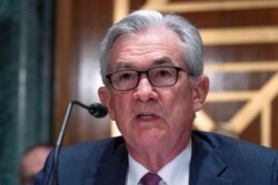 FILE - Federal Reserve Board Chair Jerome Powell testifies on Capitol Hill in Washington, July 15, 2021.