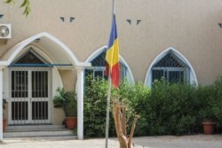 A Chad national flag flies at half staff outside a building on April 21, 2021, after Chad's President Idriss Deby Itno died on April 20, 2021, from wounds suffred in battle after three decades in power.
