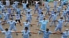 Nurses participate in a Zumba aerobic fitness program as a way of helping them to cope with working situations during the coronavirus outbreak within the Infectious Disease Unit grounds of the Kenyatta National Hospital in Nairobi, Kenya.