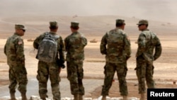 FILE - U.S. soldiers take part in Exercise Eager Lion at one of the Jordanian military bases in Zarqa, east of Amman, Jordan, May 24, 2016.