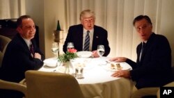 President-elect Donald Trump, center, eats dinner with Mitt Romney, right, and Trump Chief of Staff Reince Priebus at Jean-Georges restaurant, Nov. 29, 2016.