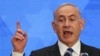 Perdana Menteri Israel Benjamin Netanyahu berpidato dalam sebuah acara yang digelar oleh Organisasi Yahudi Amerika di Yerusalem, pada 18 Februari 2024. (Foto: Reuters/Ronen Zvulun)