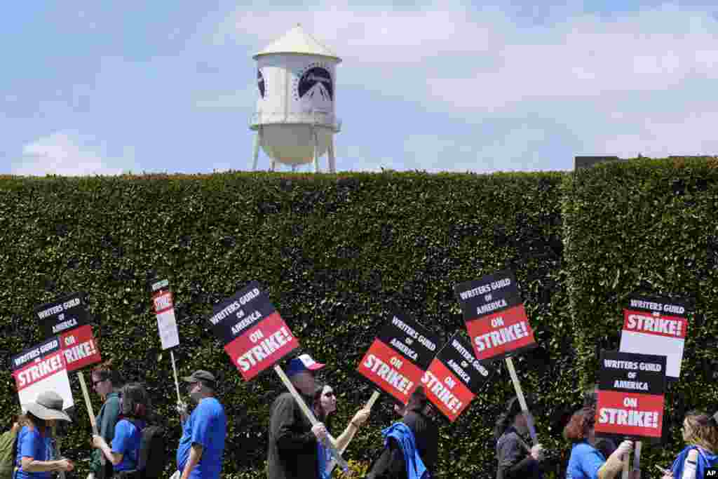 Striking writers take part in a rally in front of Paramount Pictures studio, May 2, 2023, in Los Angeles. California.&nbsp;