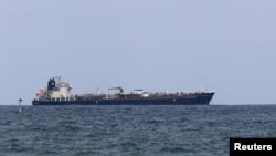 资料照片：悬挂香港旗帜的“海马号”(Sea Horse)油轮抵达委内瑞拉水域后，停泊在委内瑞拉卡贝略港(Puerto Cabello)沿岸附近；该船载有约20万桶原产自俄罗斯、原定运往古巴的燃料。(2026年3月28日)