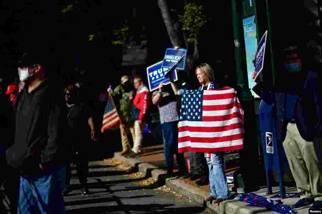 Trump supporters gather after Democratic presidential nominee Joe Biden overtook President Donald Trump in the Pennsylvania general election vote count, in Philadelphia, Pennsylvania, Nov. 6, 2020.