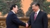 China’s Xi, former Taiwanese president push unification