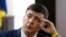Ukrainian comedian Volodymyr Zelenskiy, who played the nation's president in a popular TV series, and is running for president in next month's election, is photographed on the set of a movie, in Kiev, Ukraine, Wednesday, Feb. 6, 2019. 
