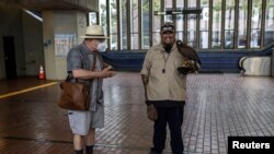 San Francisco metro system hires bird of prey to scare pigeons away