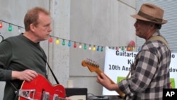 Mike Hardwick and Jon Dee Graham perform at 2010 SXSW festival in Austin, Texas