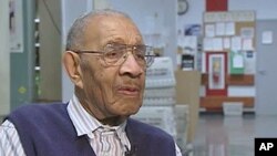 Mazerine Wingate, 100 years old, has sharp eyesight, drives a car, still goes to work six days a week at a post office in the eastern state of Maryland, and advises it's important to keep moving, February 2011