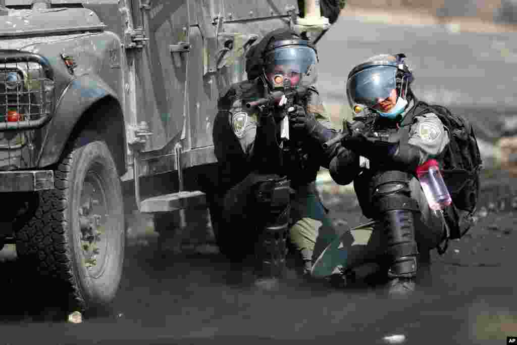 Israeli troops clash with the Palestinian demonstrators following a weekly demonstration against Israeli Jewish settlements, in the West Bank village of Kafr Qaddum near Nablus.