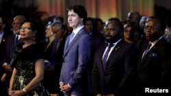 Ann Marie Davis, wife of The Bahamas' Prime Minister Philip Davis, Canada’s Prime Minister Justin Trudeau, Chief Justice Ian Winder and Deputy Prime Minister and Minister of Tourism, Investment and Aviation Issac Chester Cooper attend the CARICOM opening ceremony at Paradise Island, Bahamas, February 15, 2023.