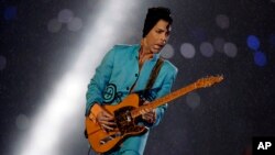 FILE - Prince performs during the halftime show at Super Bowl XLI at Dolphin Stadium in Miami, Feb. 4, 2007.