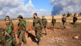 Abasirikare bayoboka Prezida Bashar al-Assad wa Siriya.