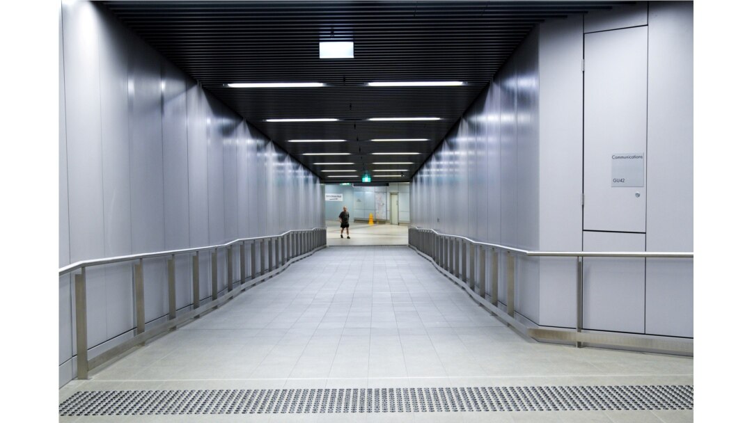 A man walks at a desert train station amid the spread of the coronavirus disease (COVID-19) in Sydney, Australia, April 6, 2020.