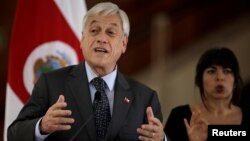 FILE - Chile's President Sebastian Pinera attends a news conference at the Presidential house in San Jose, Costa Rica, July 9, 2018. 