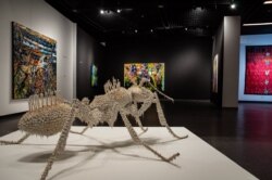 A sculpture by Moroccan artist Fathiya Tahiri titled “La Fourmi” is displayed at Dakar's Museum of Black Civilizations. (Photo: A. Hammerschlag/VOA)