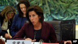 FILE - U.S. Commerce Secretary Gina Raimondo speaks during a meeting with her Chinese counterpart Wang Wentao, unseen, at the Ministry of Commerce in Beijing, Aug. 28, 2023. 