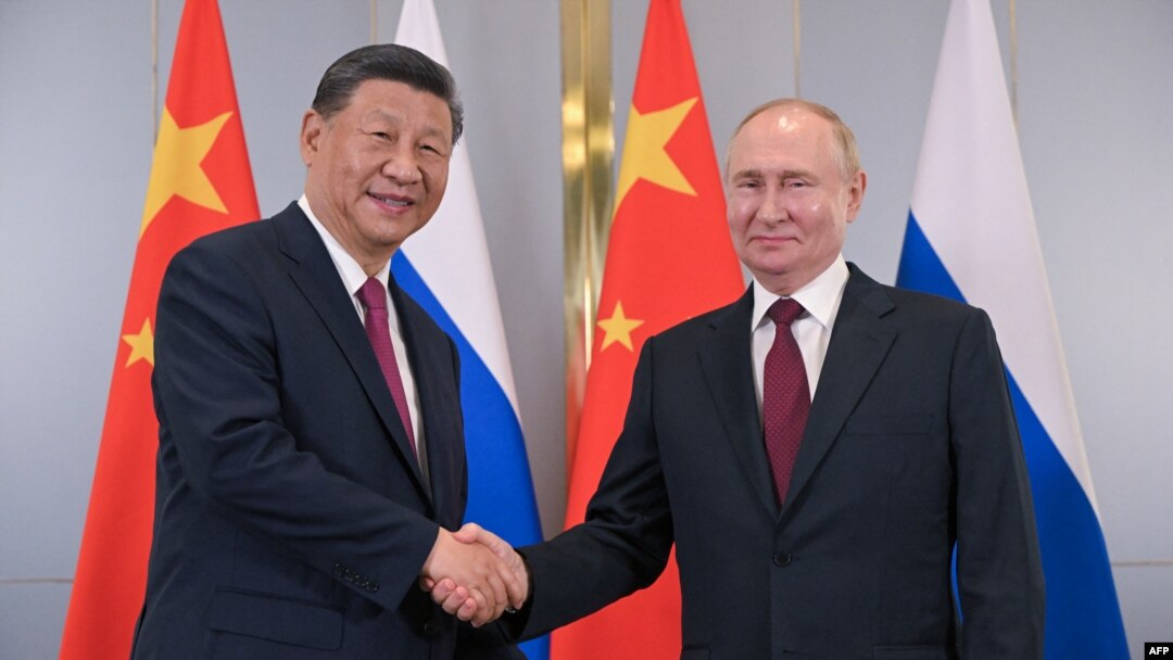 Ši Đinping i Vladimir Putin (Foto: AFP/Sergei GUNEYEV)